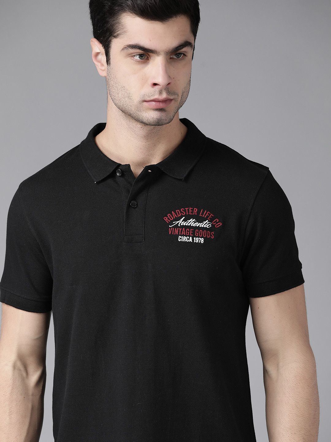 

Roadster Men Black Solid Pure Cotton Polo Collar Pure Cotton T-shirt
