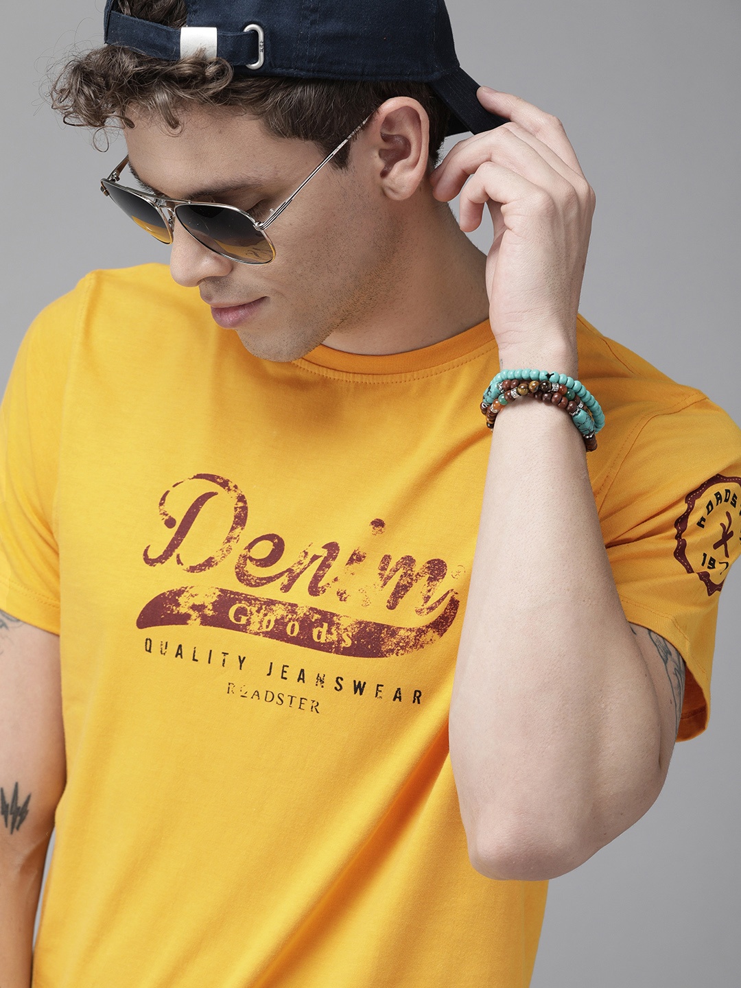 

Roadster Men Yellow Printed Round Neck Pure Cotton T-shirt