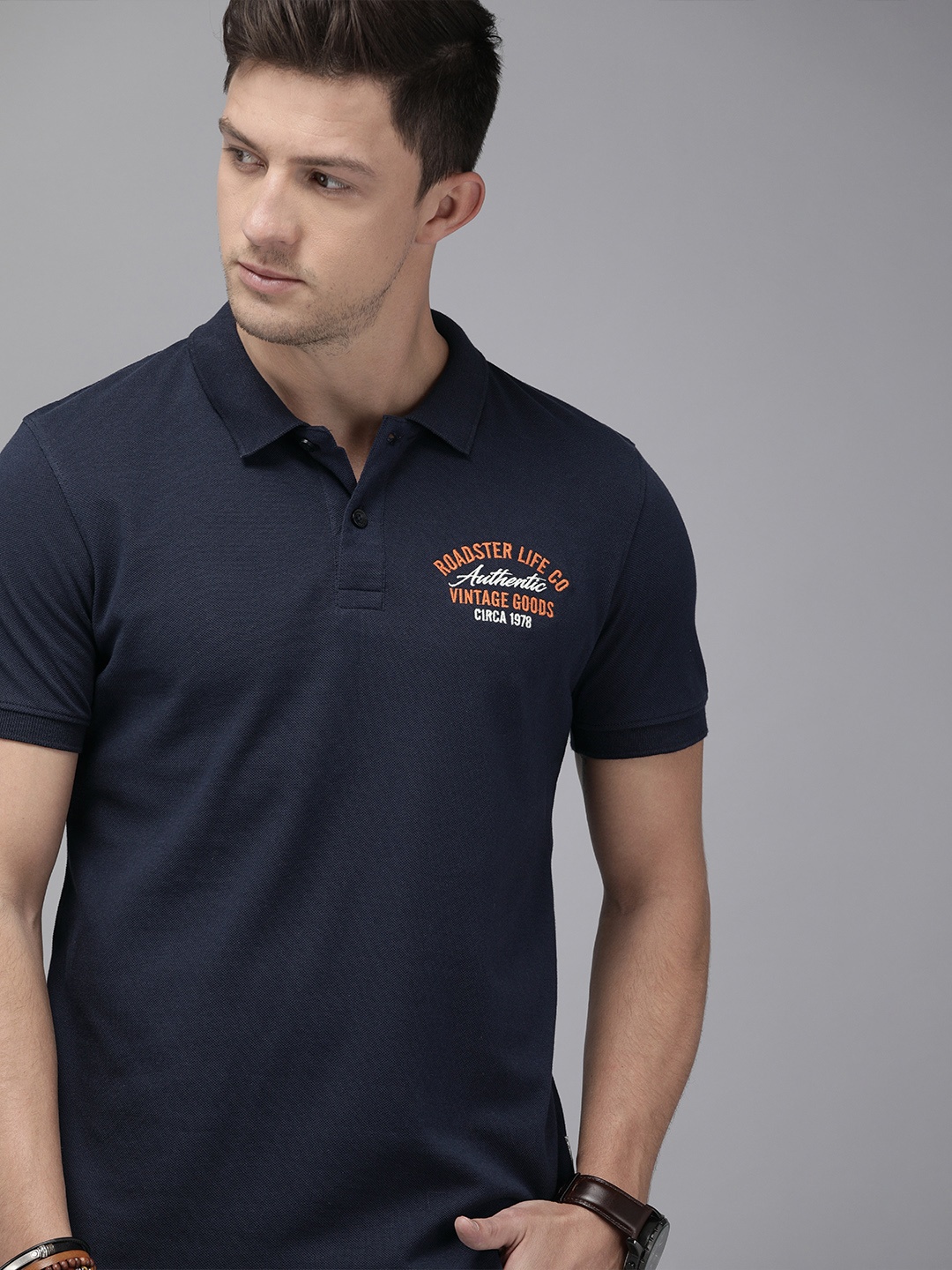 

Roadster Men Navy Blue Solid Polo Collar Pure Cotton T-shirt with Embroidery