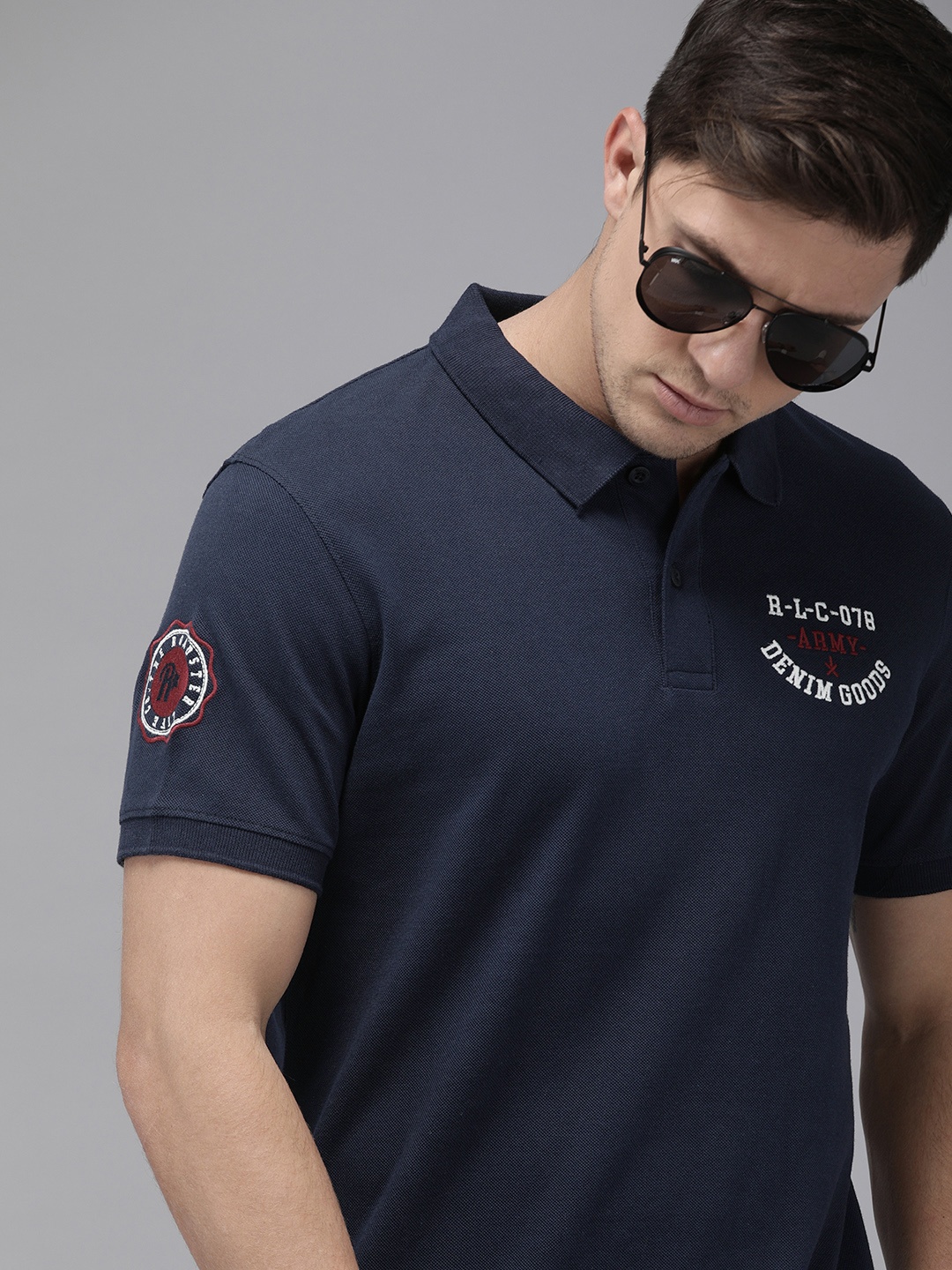 

Roadster Men Navy Blue Solid Polo Collar Pure Cotton T-shirt with Embroidery