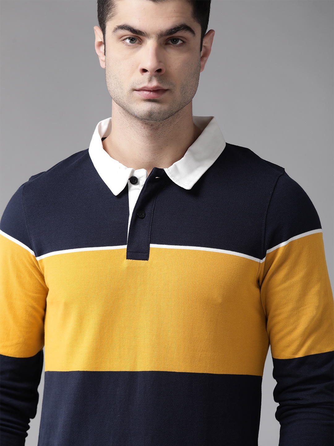 

Roadster Men Navy Blue & Mustard Yellow Colourblocked Cotton Polo Collar T-shirt