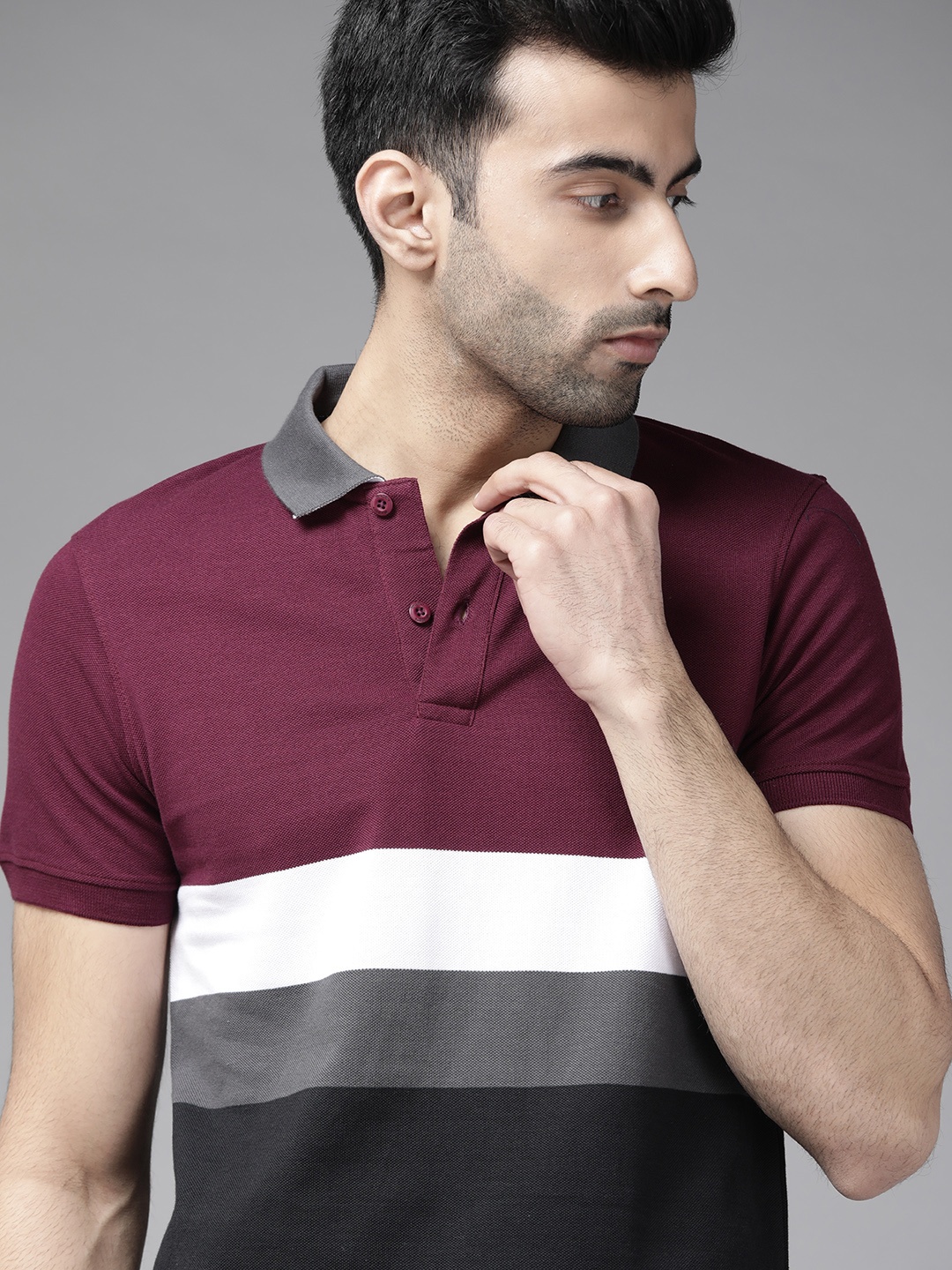 

Roadster Men Burgundy & Navy Blue Striped Polo Collar T-shirt