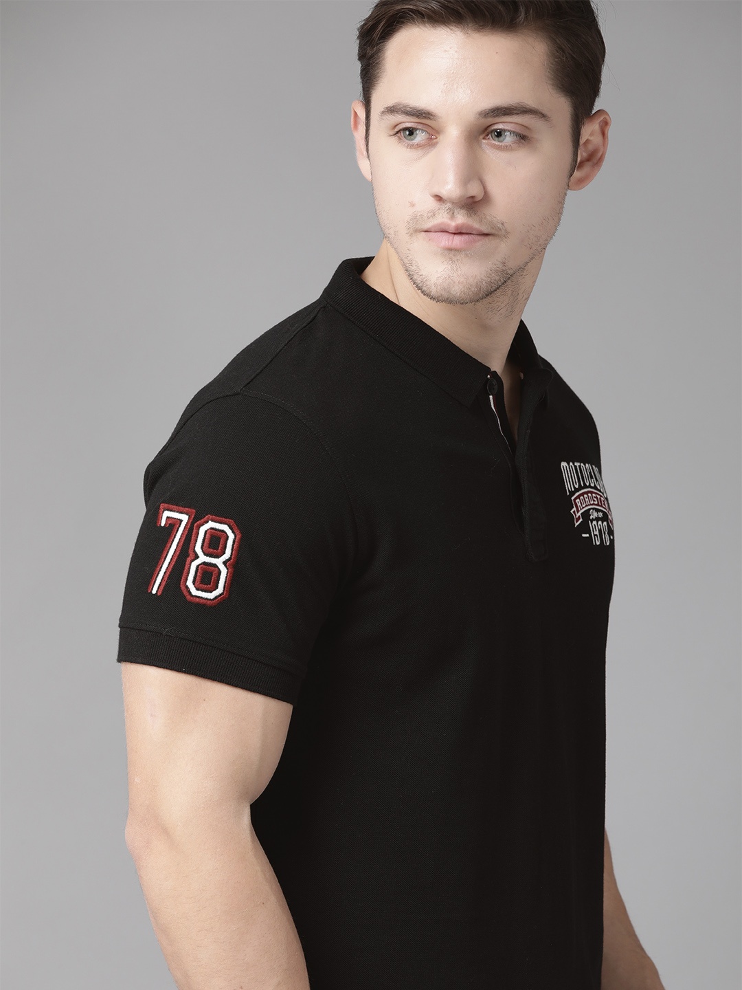 

Roadster Men Black Solid Polo Collar T-shirt