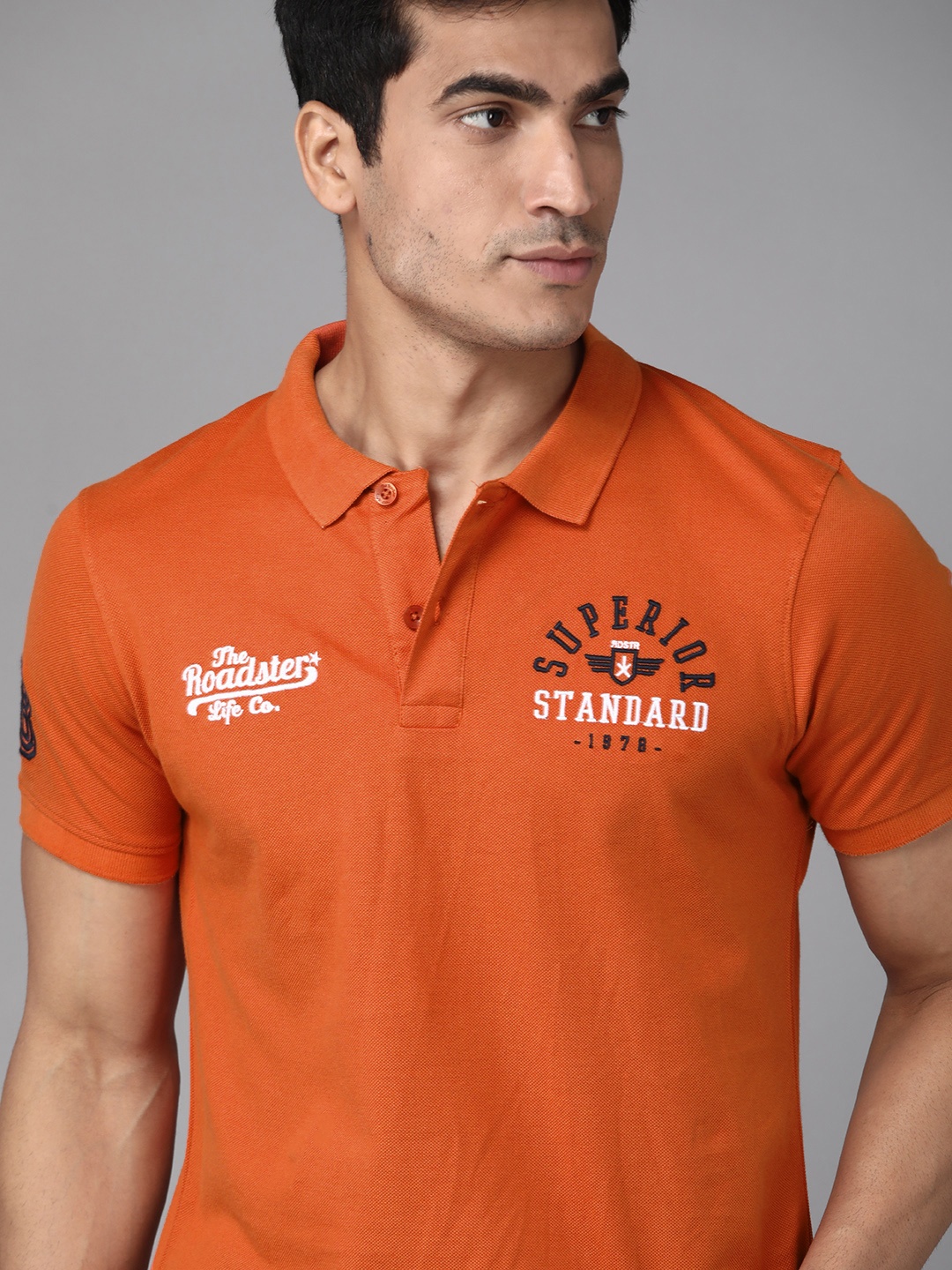 

Roadster Men Orange Pure Cotton Solid Polo Collar T-shirt