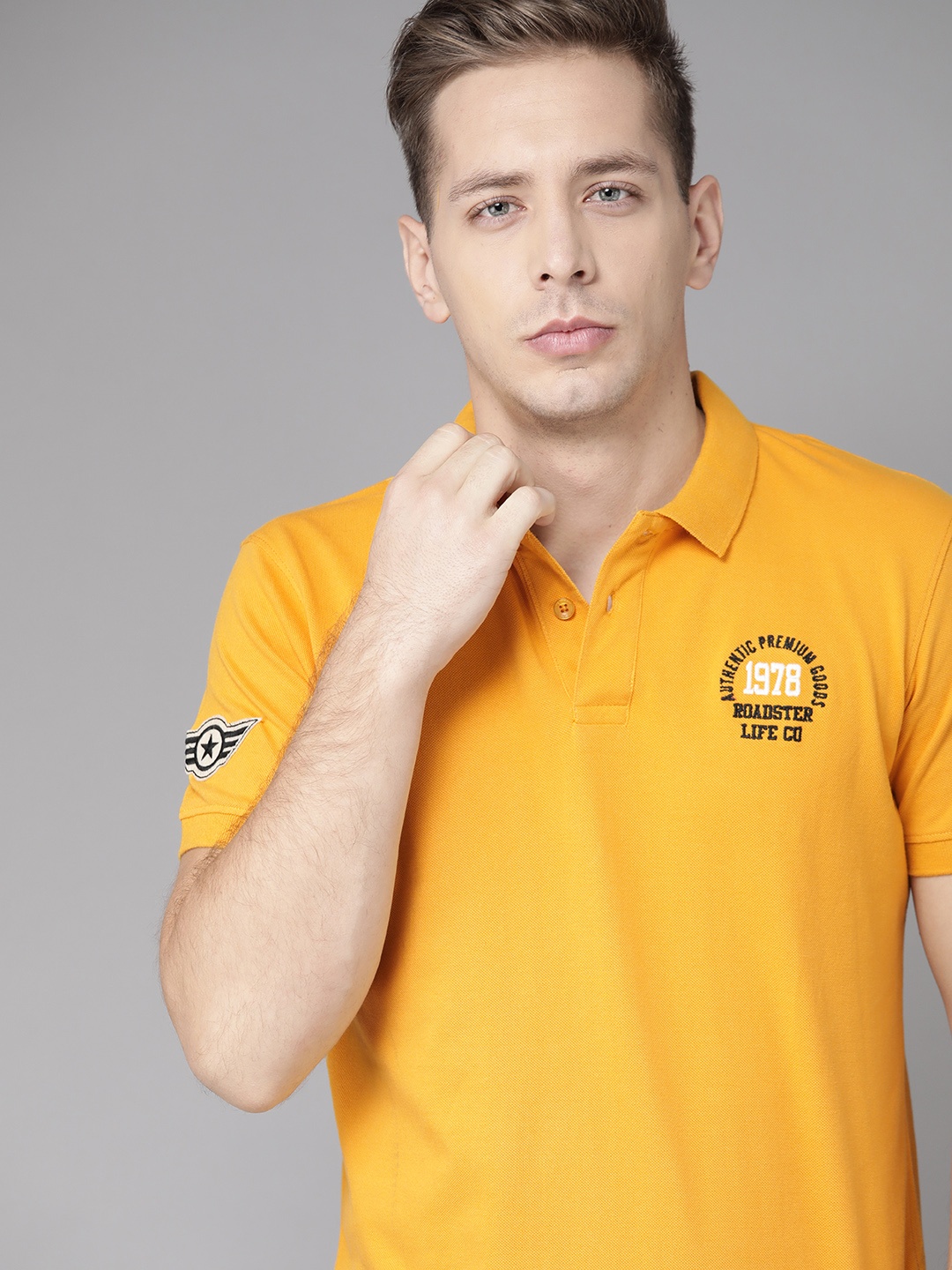 

Roadster Men Mustard Yellow Solid Polo Collar T-Shirt