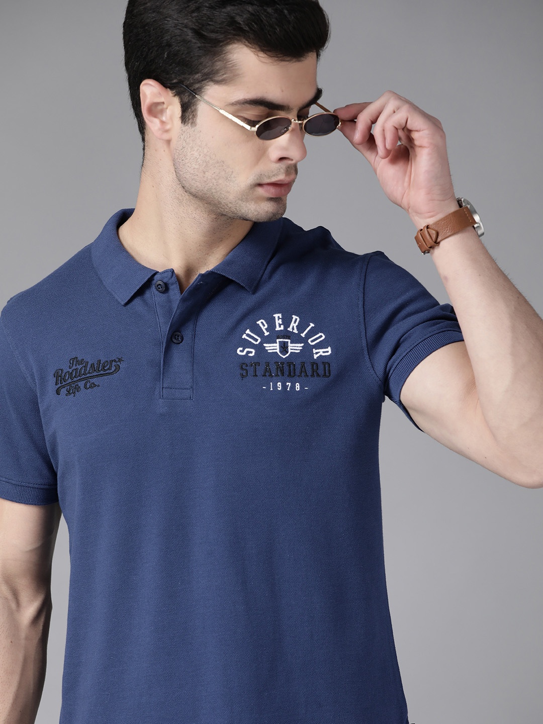 

Roadster Men Navy Blue Solid Pure Cotton Polo Collar Pure Cotton T-shirt With Embroidered Detail