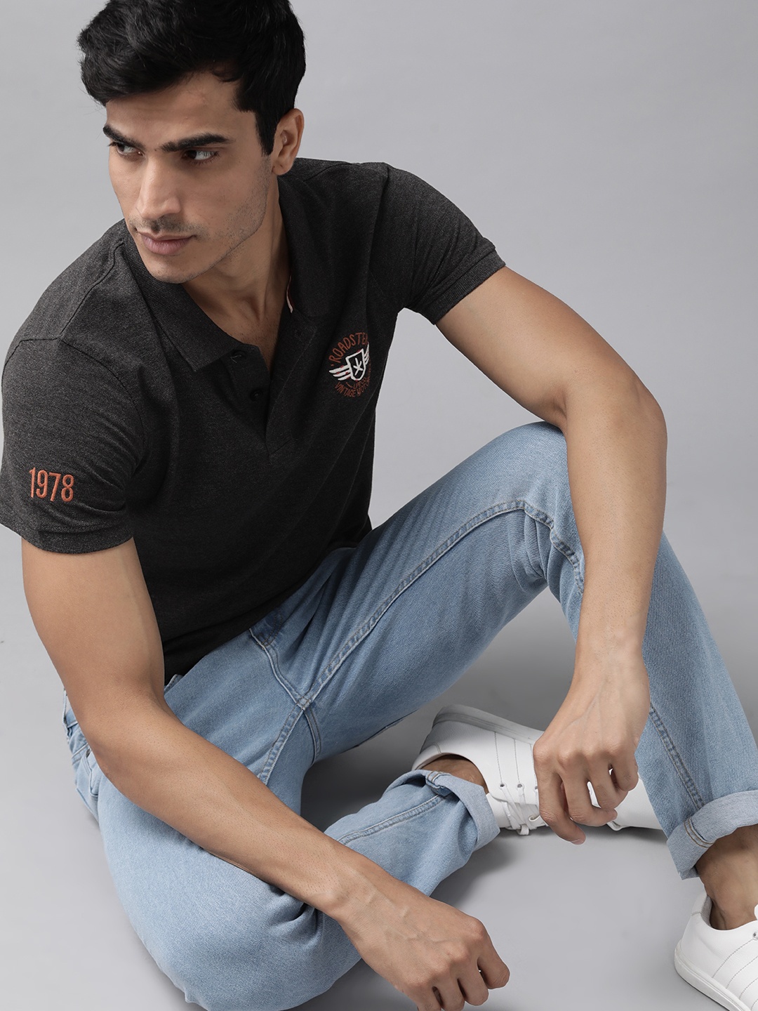 

Roadster Men Charcoal Grey Solid Polo Collar T-shirt