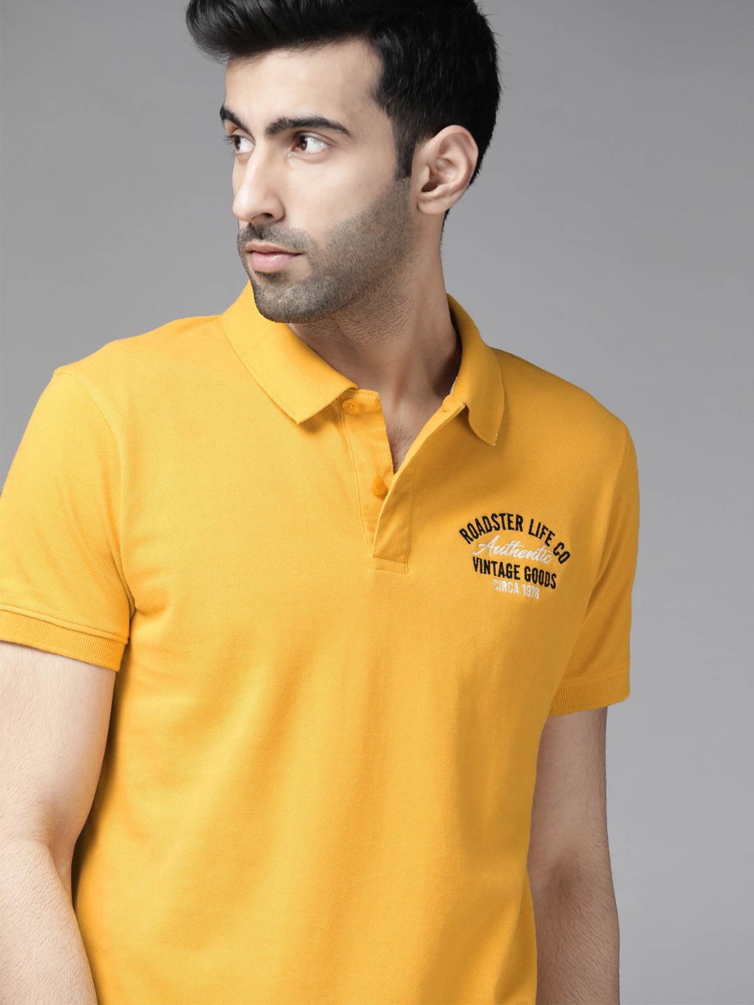 

Roadster Men Mustard Yellow Solid Polo Collar T-shirt