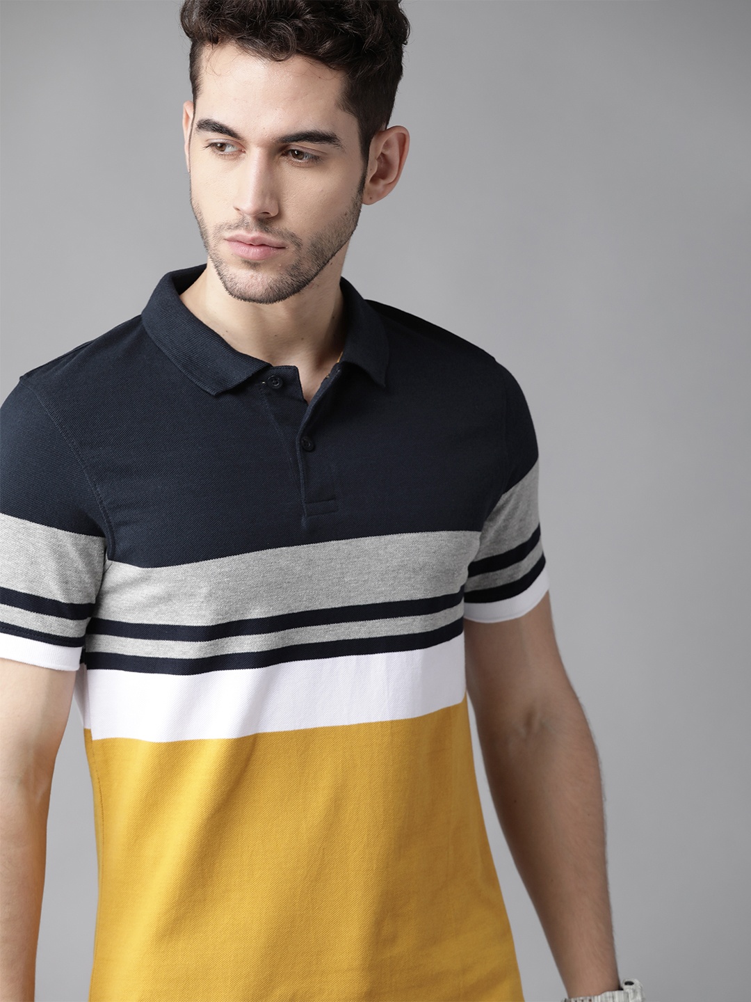 

Roadster Men Mustard Yellow & Navy Striped Polo Collar T-shirt