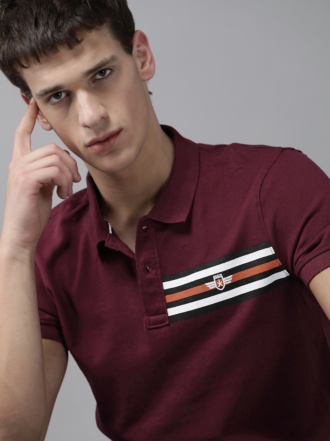 

Roadster Men Burgundy Solid Cotton Polo Collar T-shirt