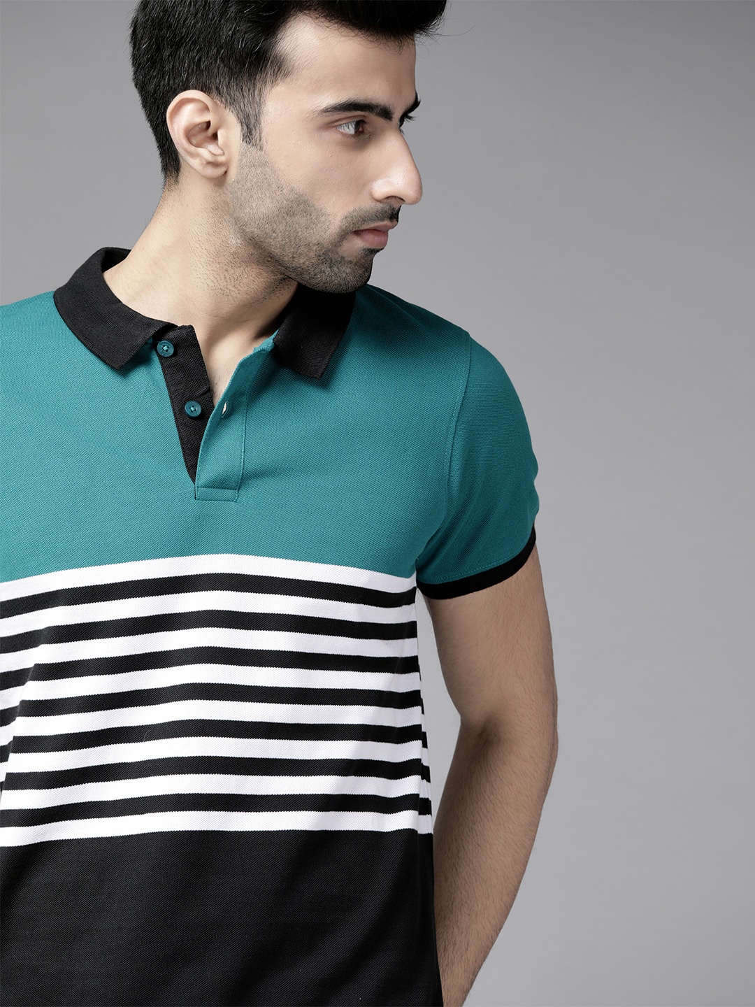 

Roadster Men Blue & White Striped Polo Collar T-shirt