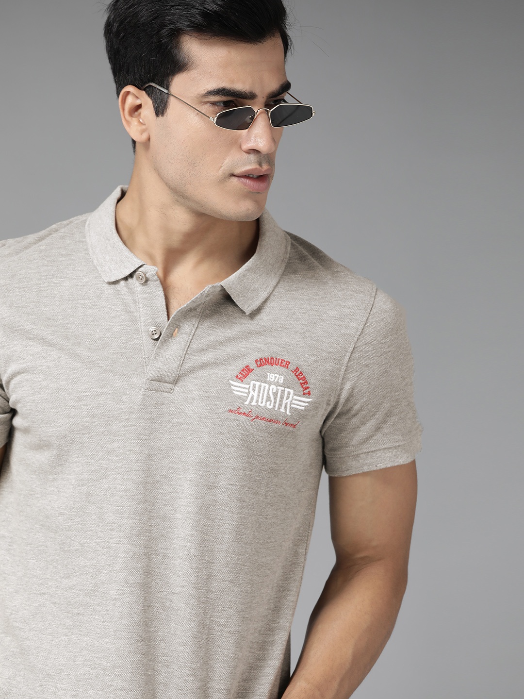 

Roadster Men Grey Melange Solid Cotton Polo Collar T-shirt