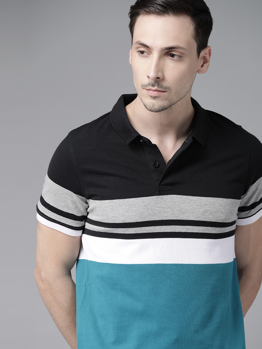 

Roadster Men Black Striped Polo Collar T-shirt