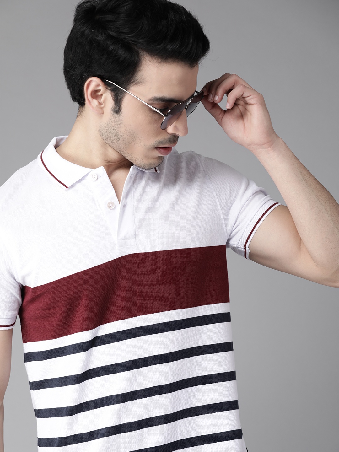 

Roadster Men White & Navy Blue Striped Polo Collar T-shirt