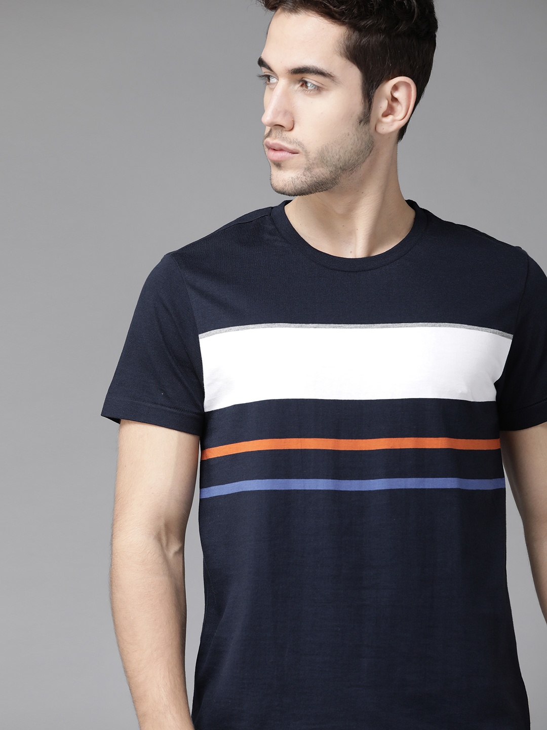 

Roadster Men Navy Blue & White Striped Round Neck T-shirt