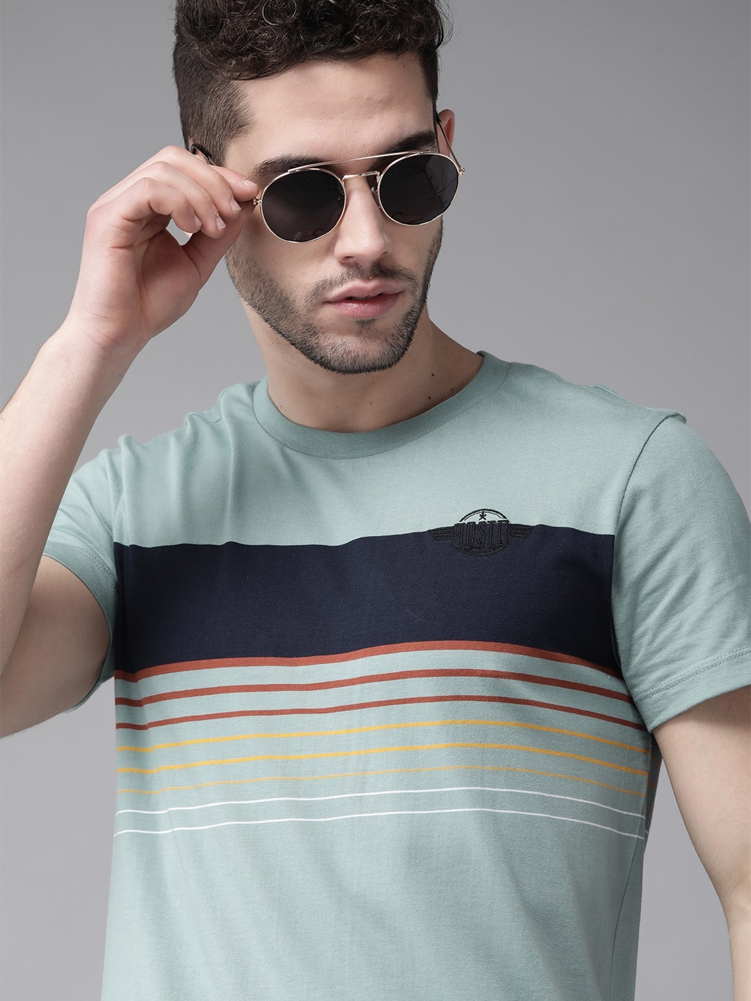 

Roadster Men Blue Pure Cotton Striped Round Neck T-shirt
