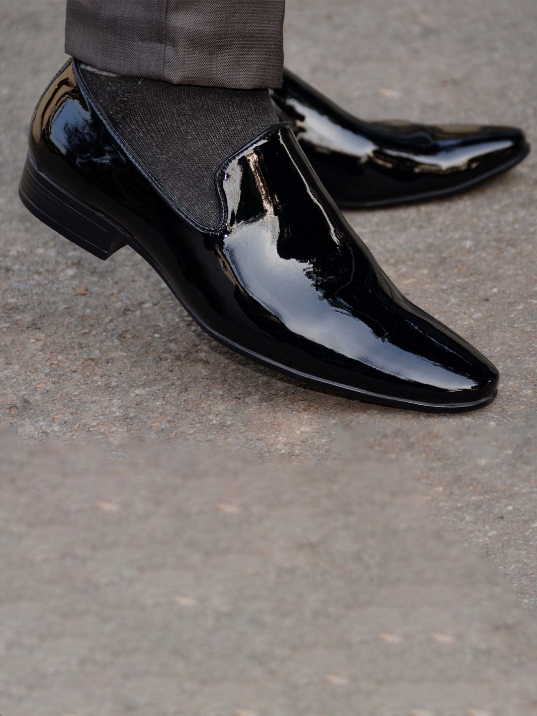 

aadi Men Black Solid Formal Slip-Ons