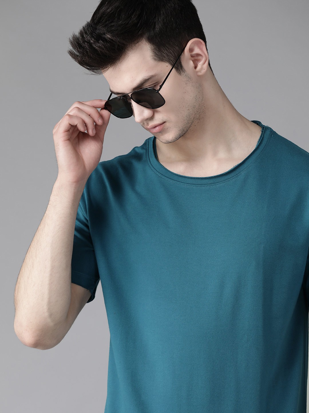 

Roadster Men Teal Blue Solid Round Neck Pure Cotton T-shirt