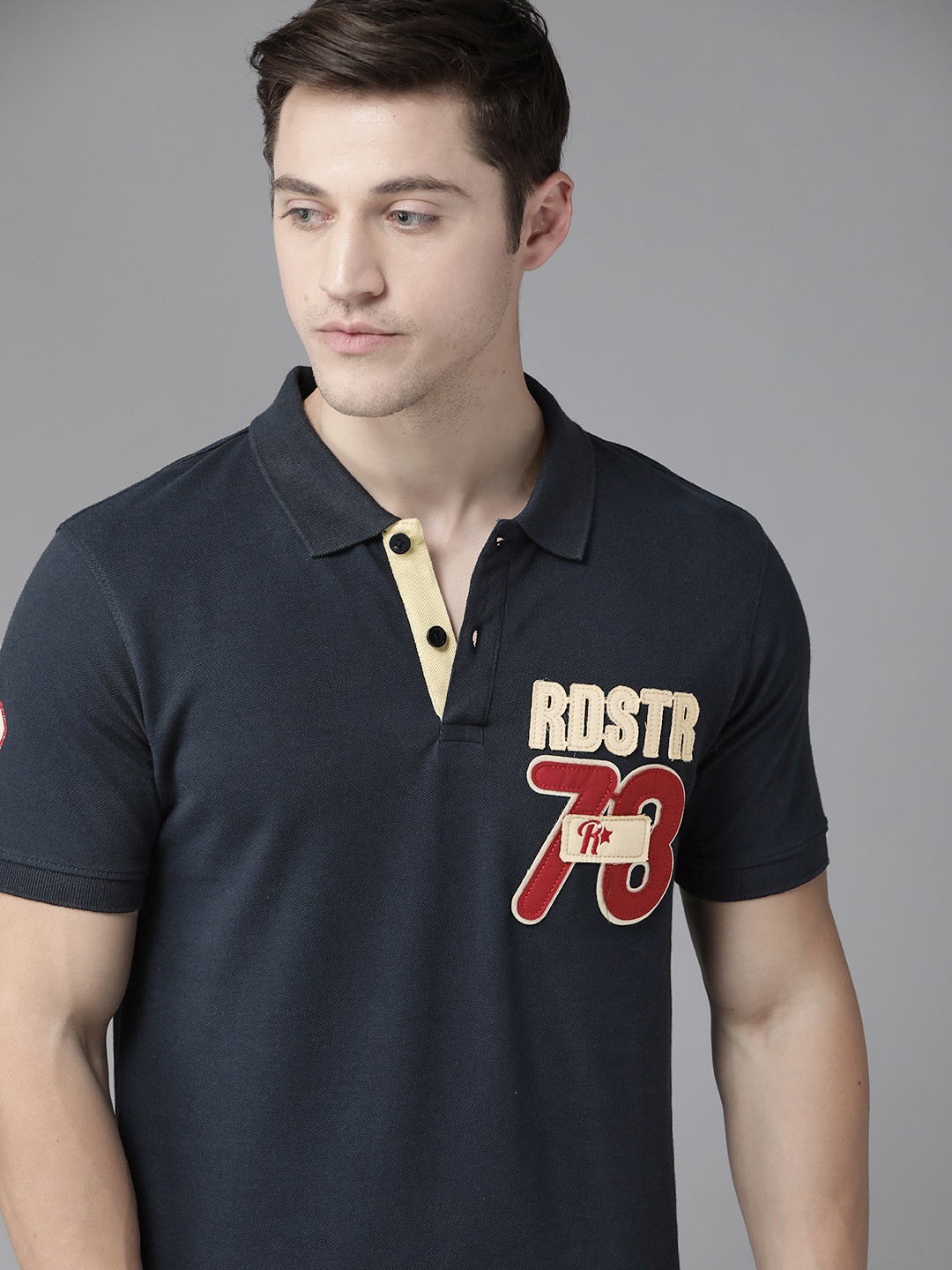 

Roadster Men Navy Blue Solid Polo Collar Pure Cotton T-shirt with Applique Detail