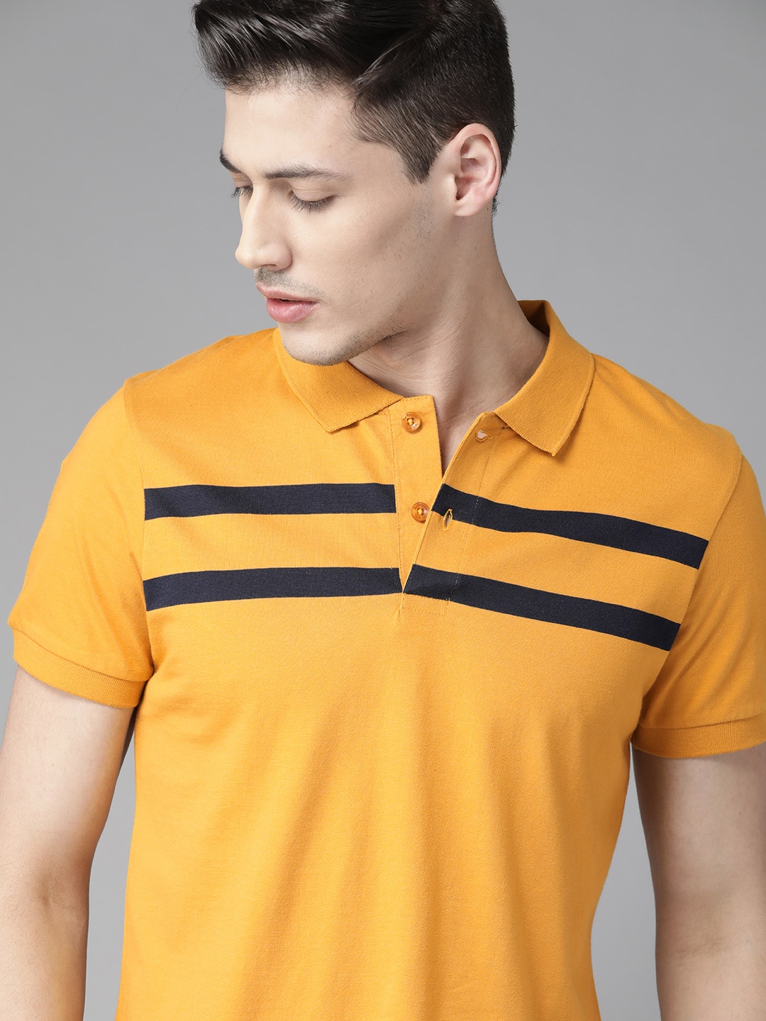 

Roadster Men Mustard Yellow Solid Polo Collar T-shirt