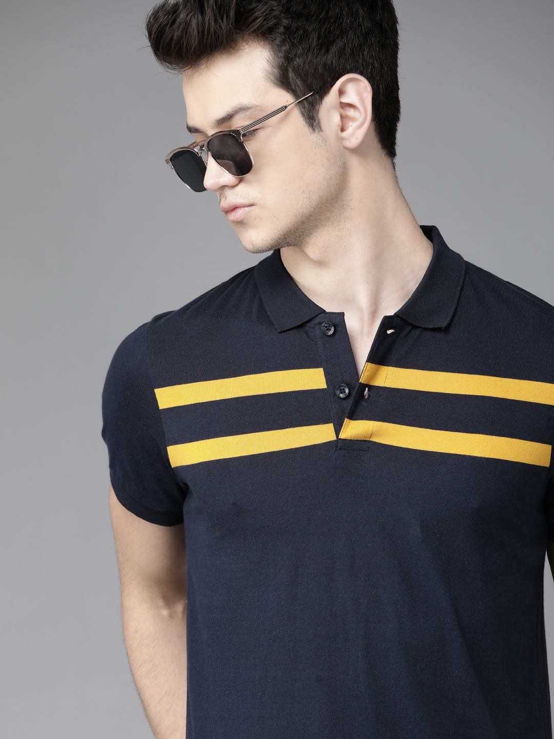 

Roadster Men Navy Blue & Mustard Yellow Striped Polo Collar T-shirt