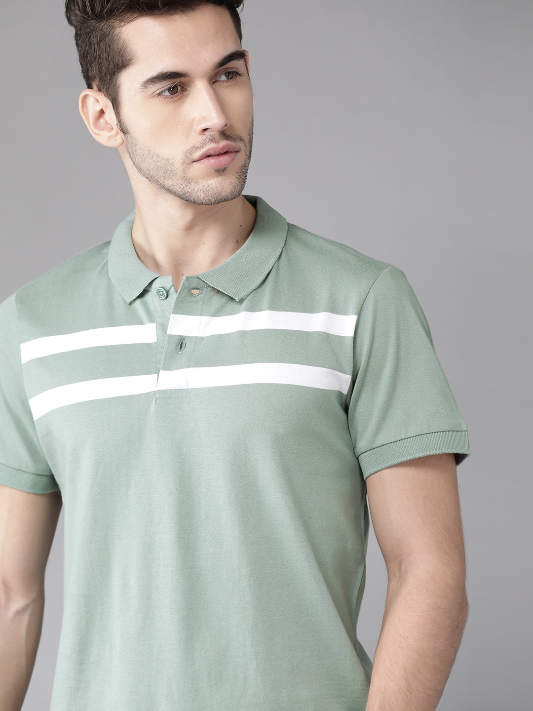 

Roadster Men Green And White Polo Collar T-Shirt With Printed Stripes