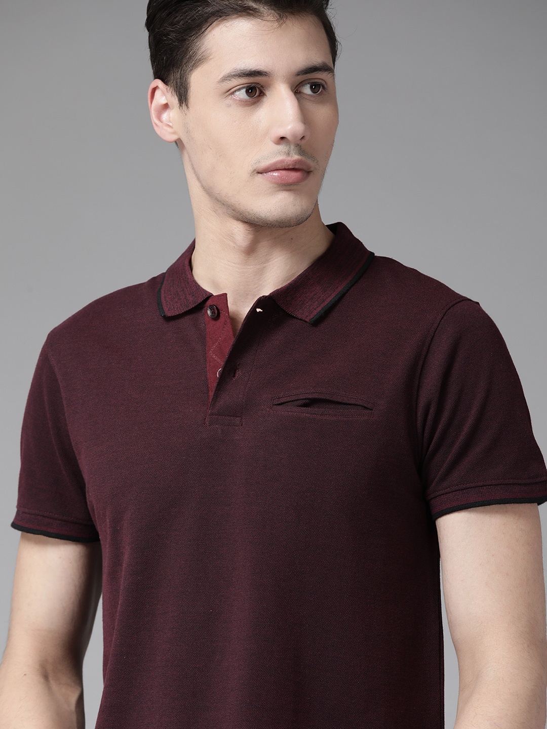 

Roadster Men Burgundy Solid Polo Collar T-shirt