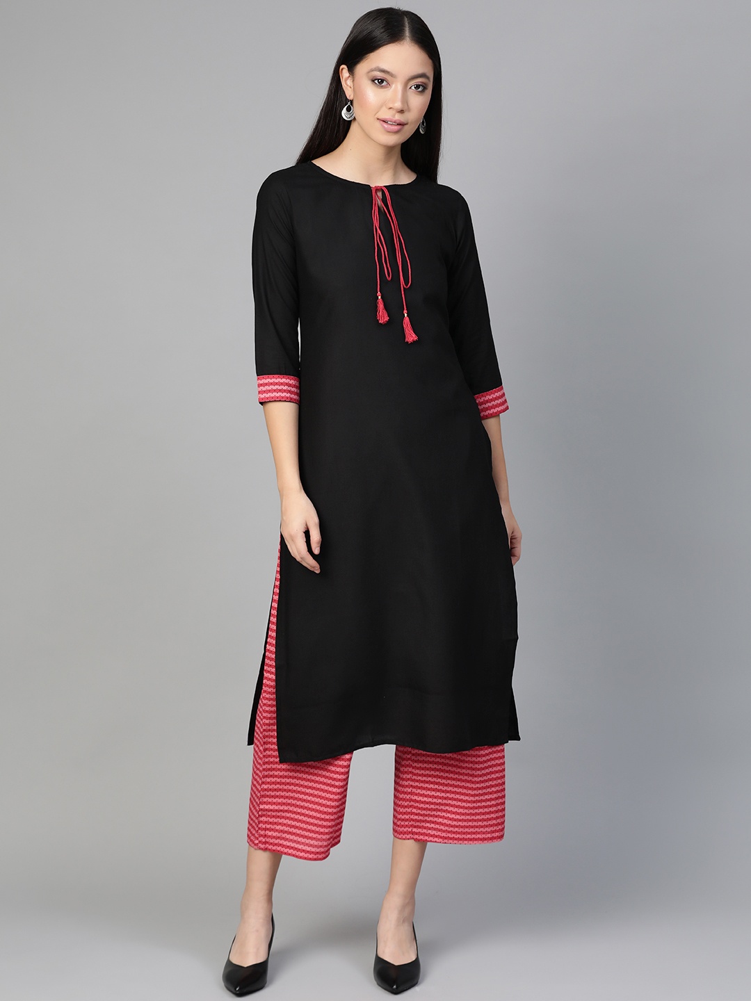 

Indo Era Women Black & Red Solid Kurta with Palazzos