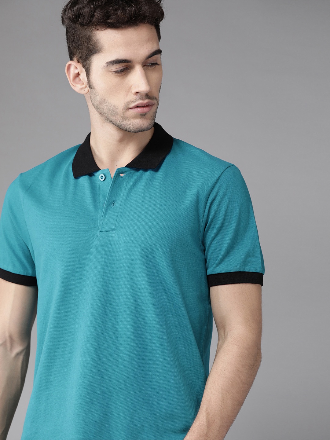 

Roadster Men Blue Solid Polo Collar Pure Cotton T-shirt