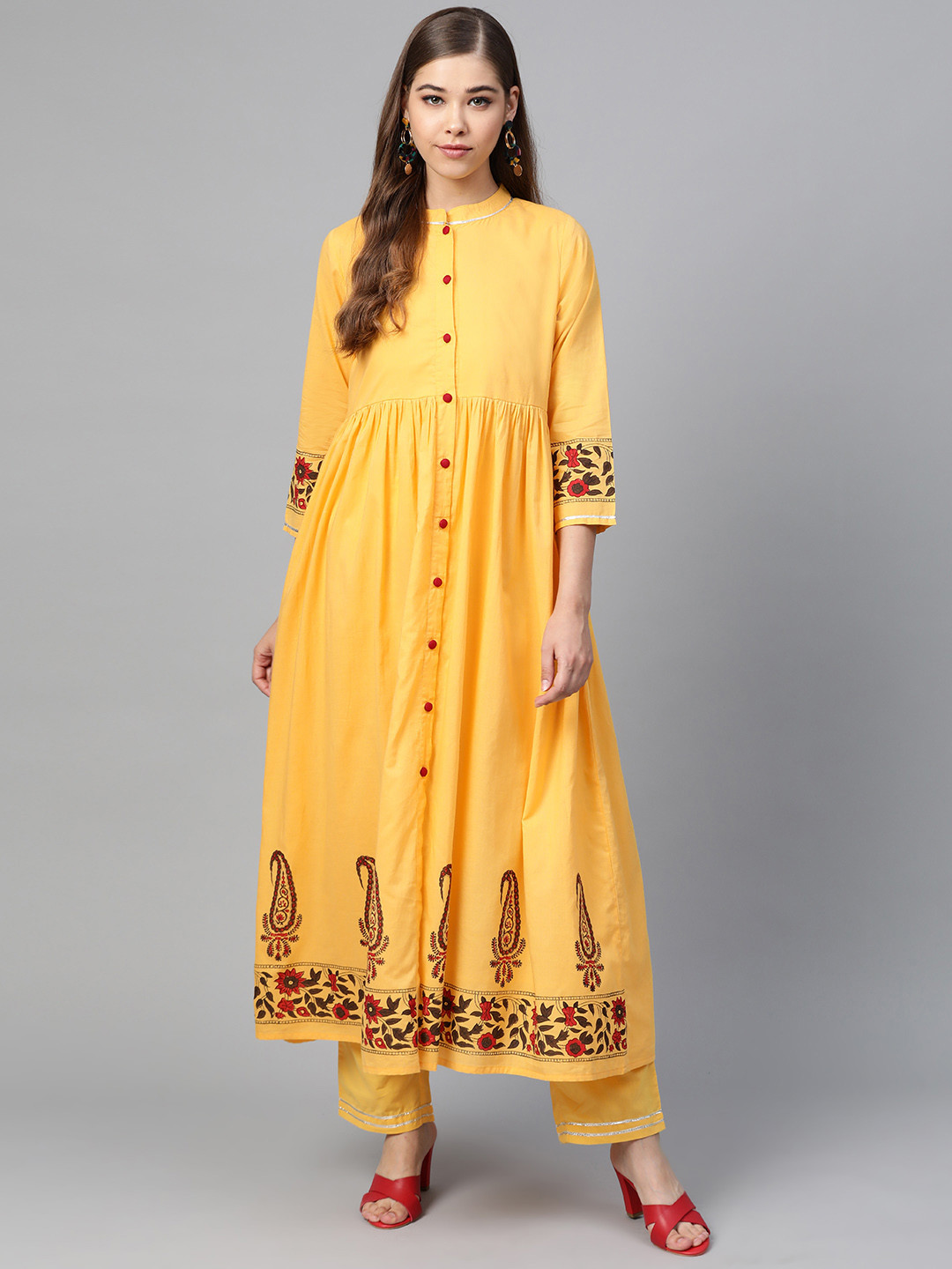

Shae by SASSAFRAS Women Yellow Block Printed Detail A-Line Kurta