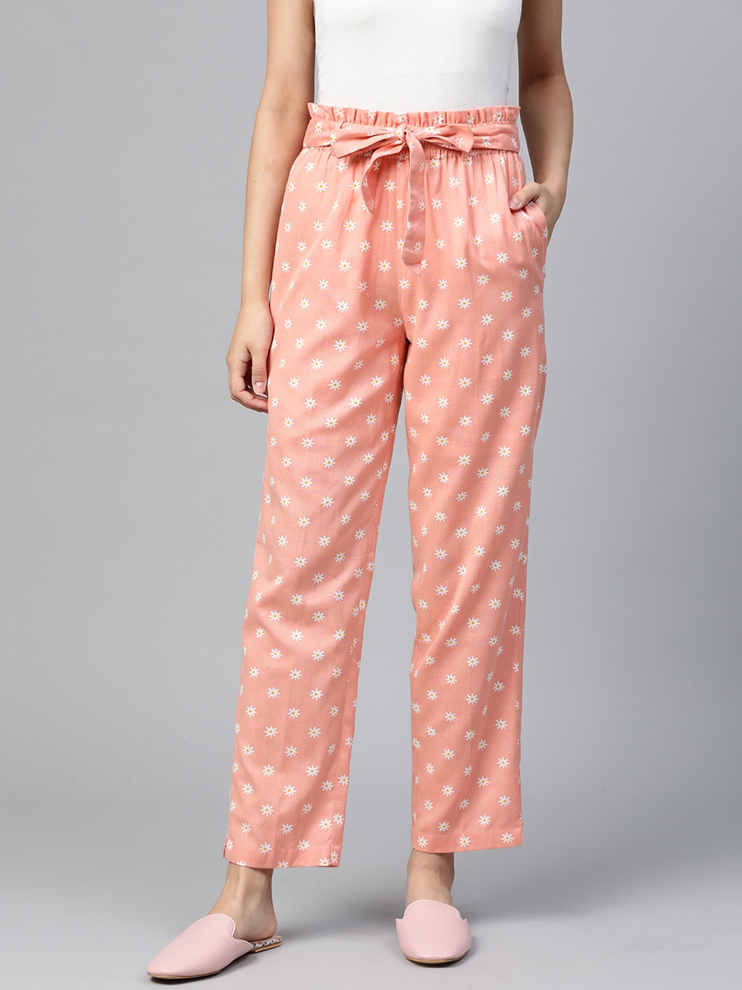 

Shae by SASSAFRAS Women Peach-Coloured & White Tapered Fit Floral Print Parallel Trousers