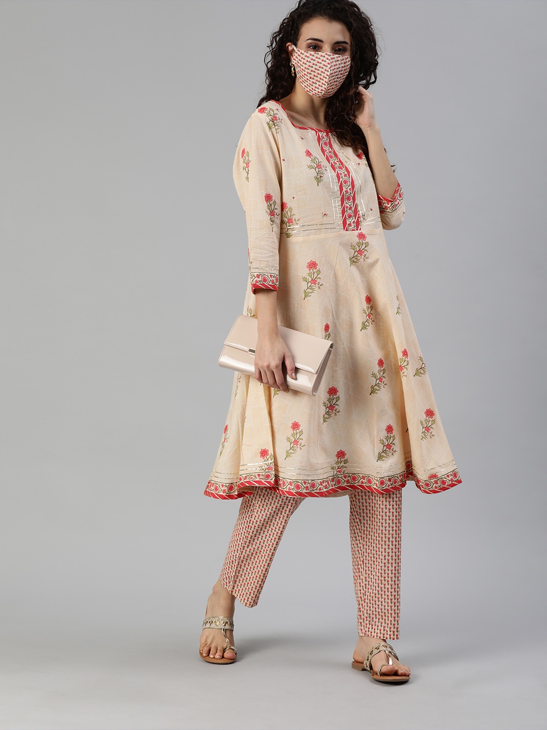 

Ishin Women Peach-Coloured Pink Floral Printed Kurta with Trousers