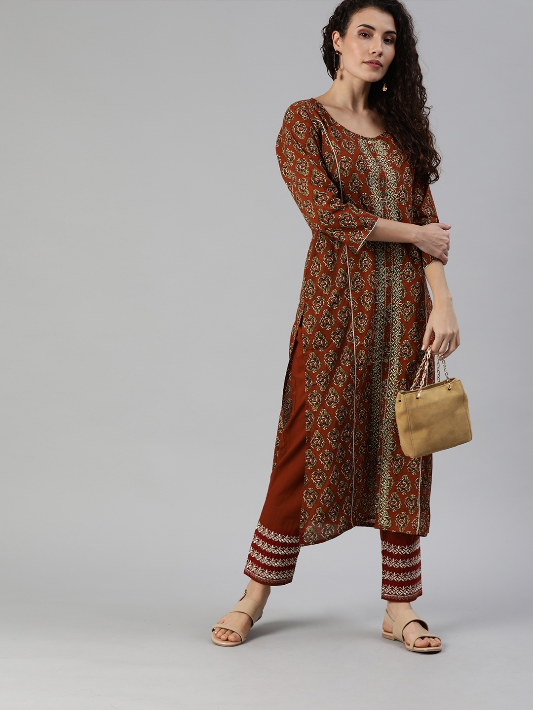 

Ishin Women Brown & Green Printed Kurta with Embroidered Trousers