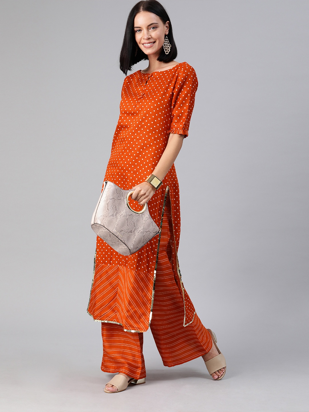 

Inddus Women Rust & White Printed Kurta with Palazzos