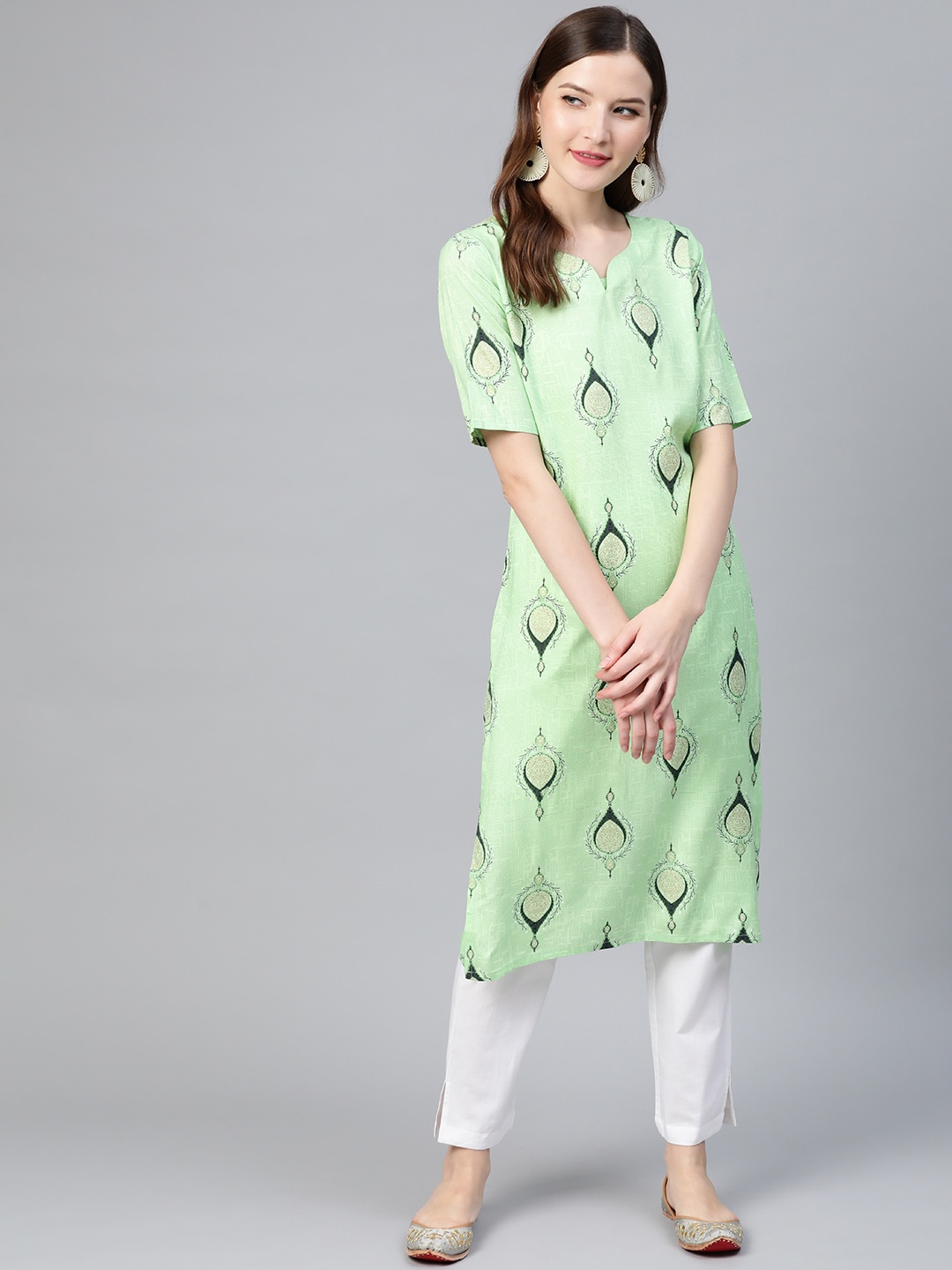 

Idalia Women Green & White Printed Kurta with Trousers