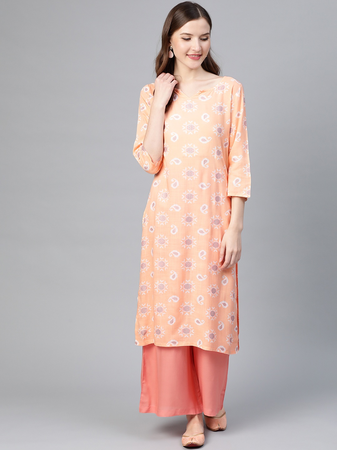 

Idalia Women Peach-Coloured & Coral Pink Printed Kurta with Palazzos