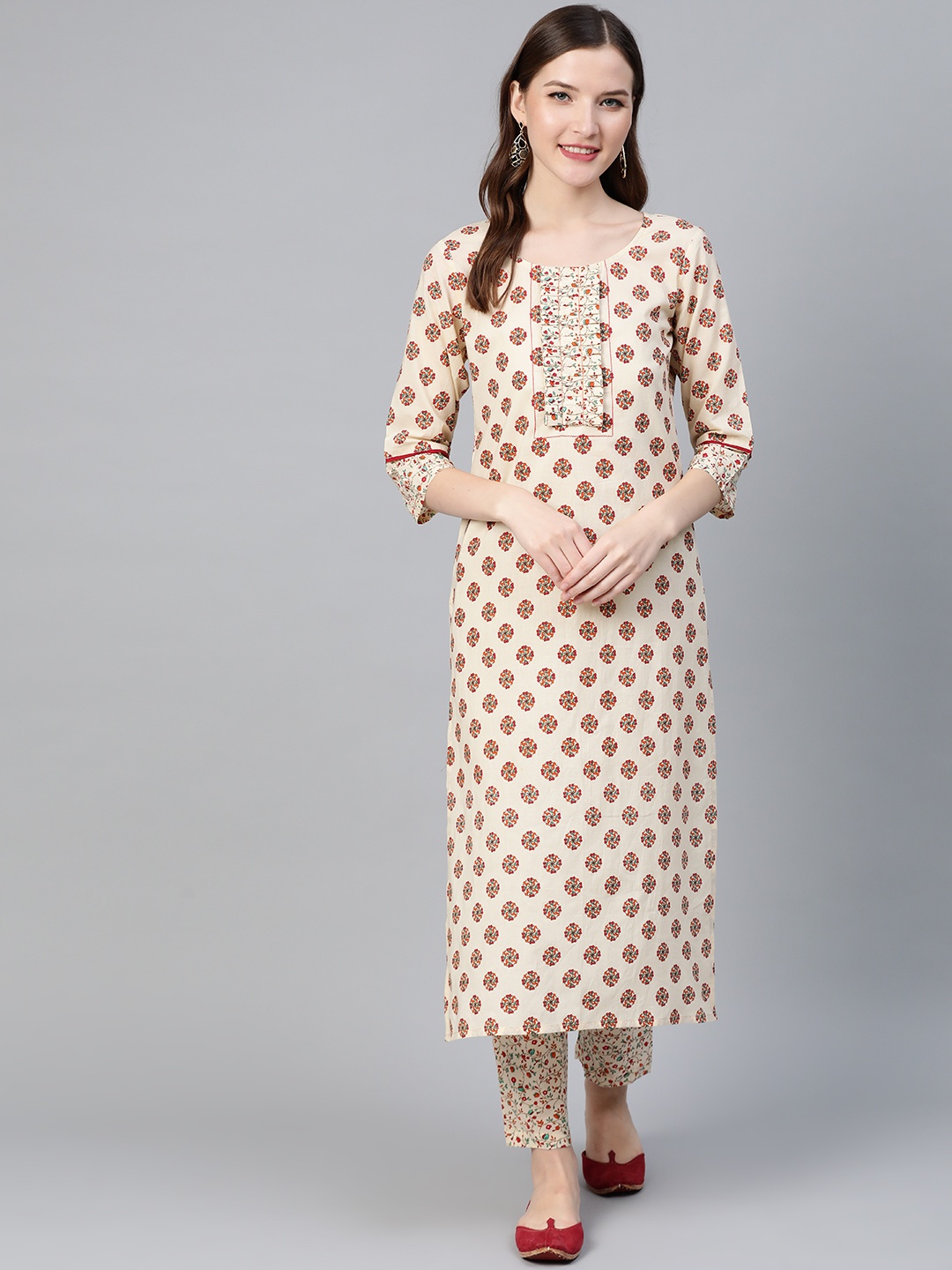 

Idalia Women Beige & Red Printed Kurta with Trousers