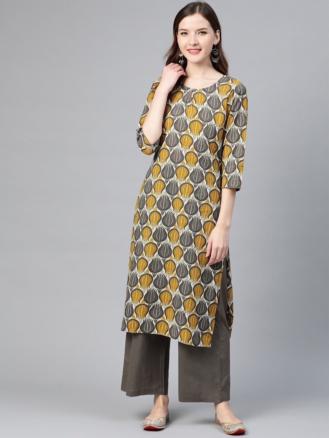 

Idalia Women Mustard Yellow & Grey Printed Kurta with Palazzos
