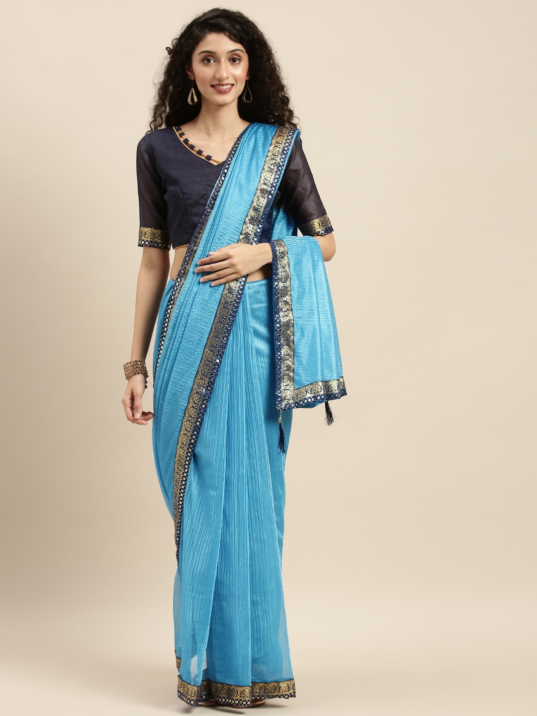 

Silk Bazar Turquoise Blue & Gold-Toned Art Silk Solid Saree