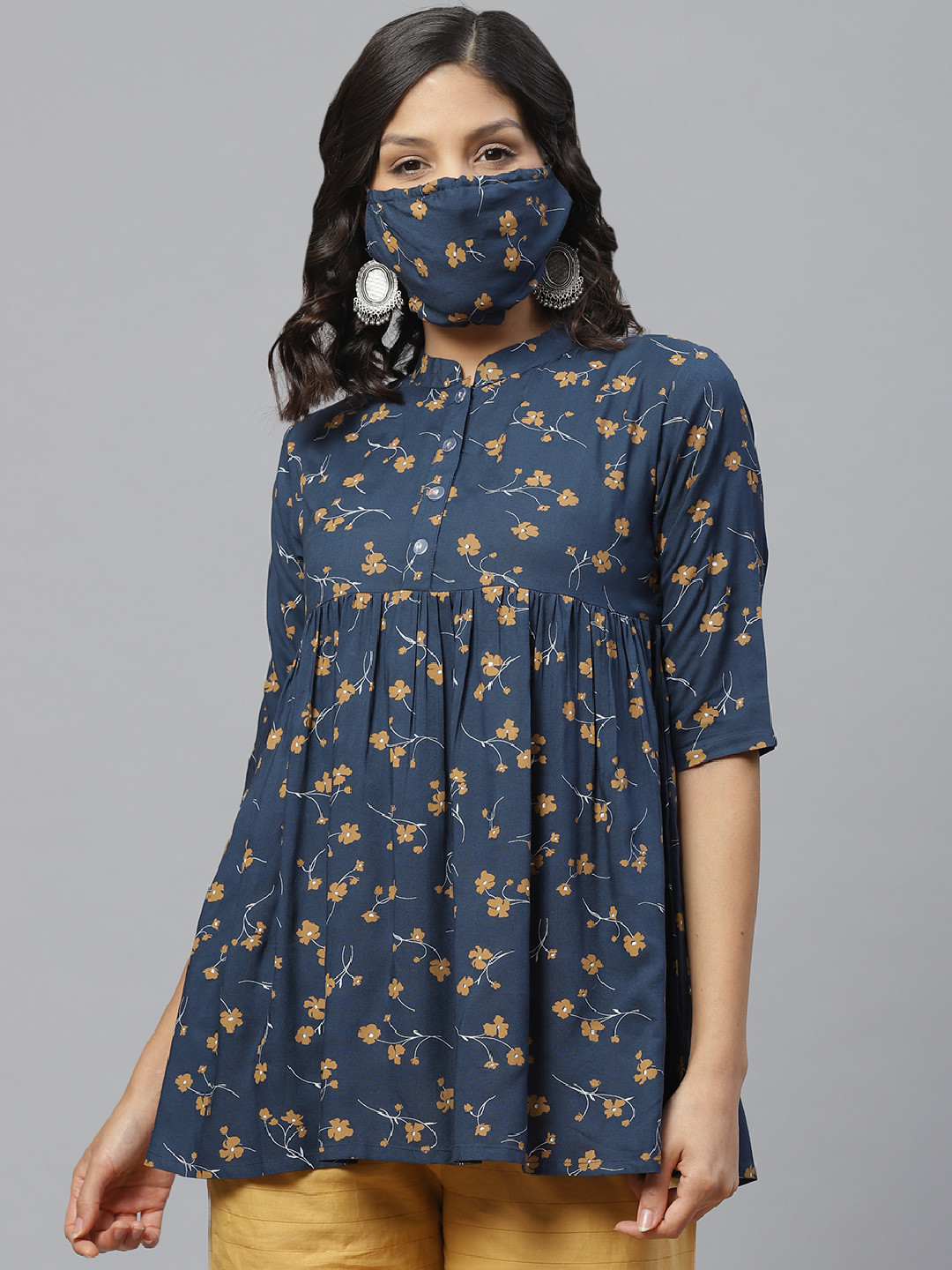 

Libas Women Navy Blue Beige Floral Printed A-Line Kurti