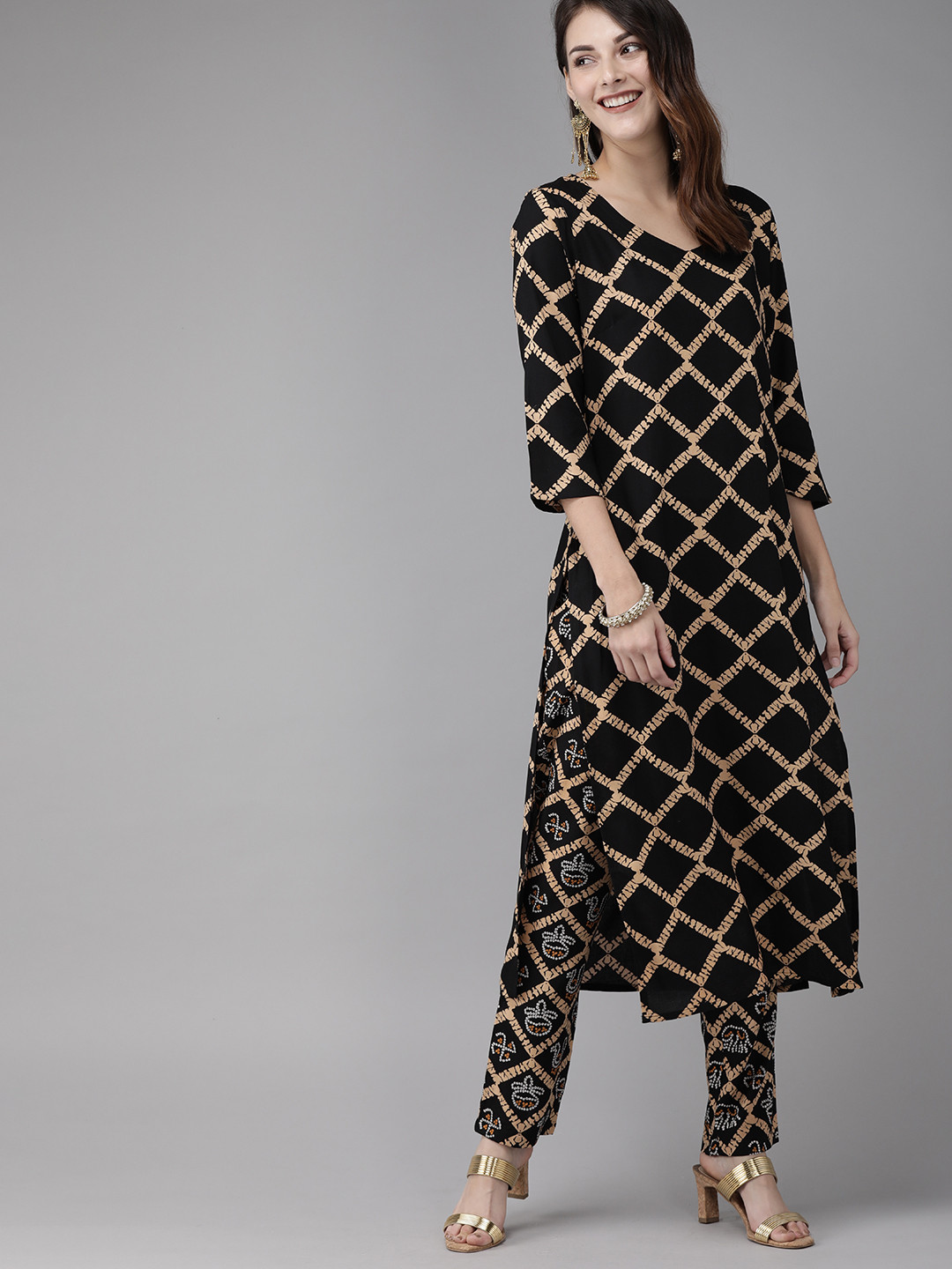 

Anouk Women Black & Gold-Toned Printed Kurta with Trousers