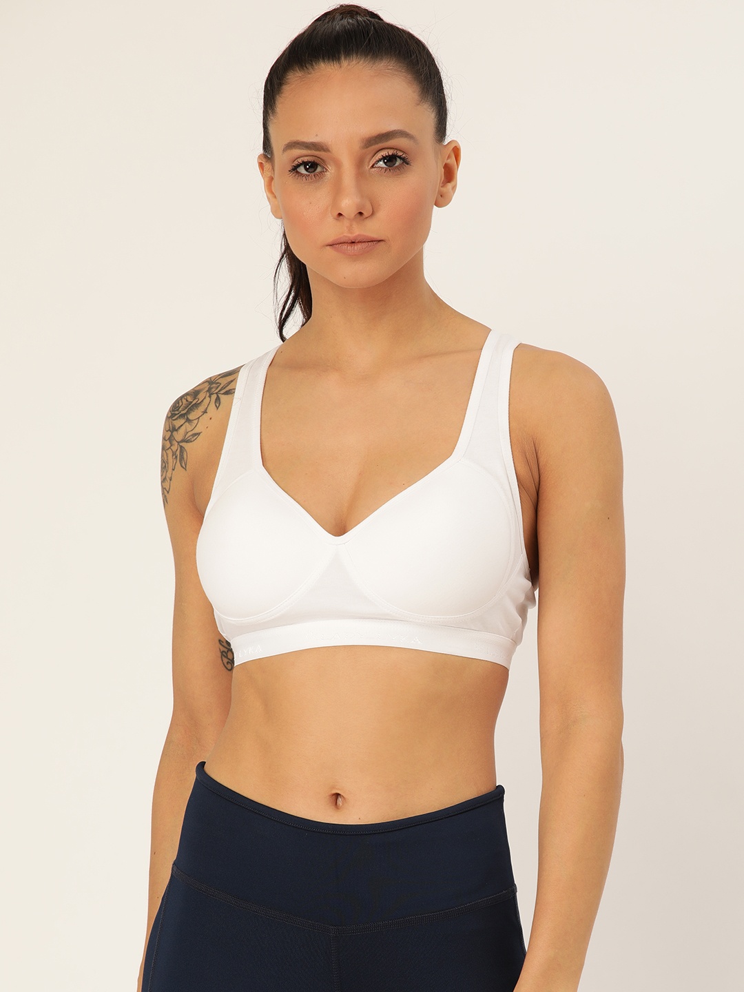 

Lady Lyka White Solid Non-Wired Lightly Padded Sports Bra PROVOGUE