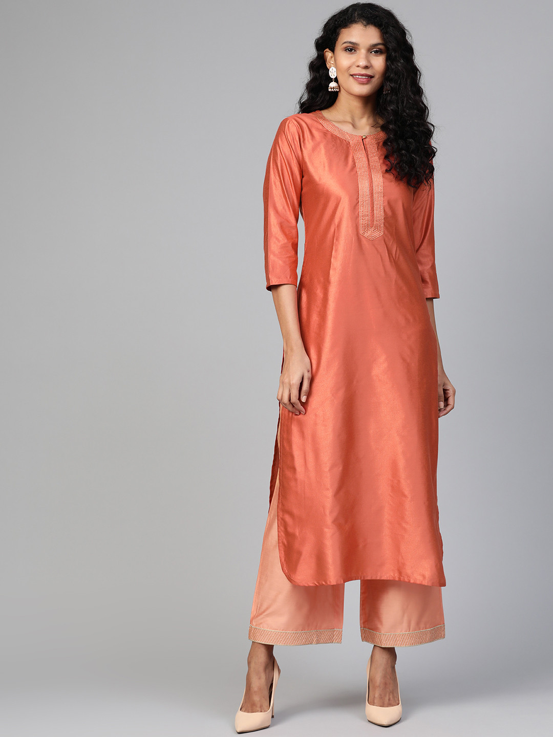 

Indo Era Women Rust Orange Solid Straight Kurta