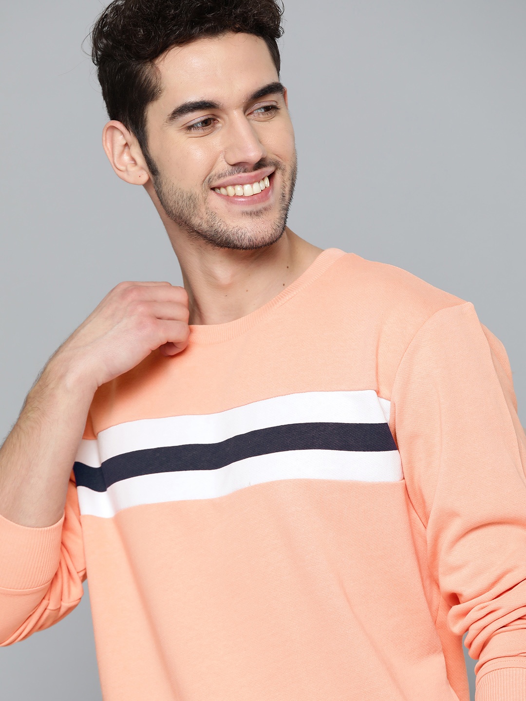 

Mast & Harbour Men Peach-Coloured Pure Cotton Solid Sweatshirt with Striped Detail