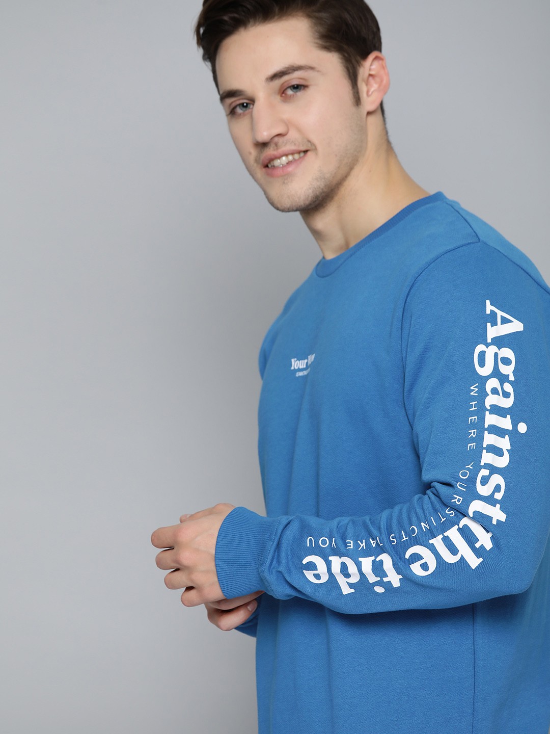 

Mast & Harbour Men Blue Pure Cotton Solid Sweatshirt
