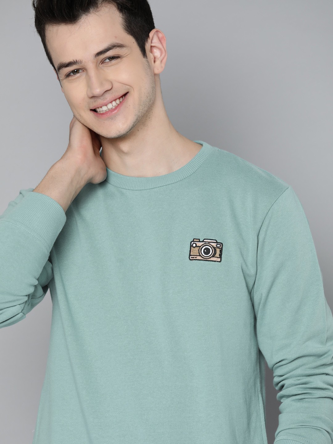 

Mast & Harbour Men Blue Solid Sweatshirt