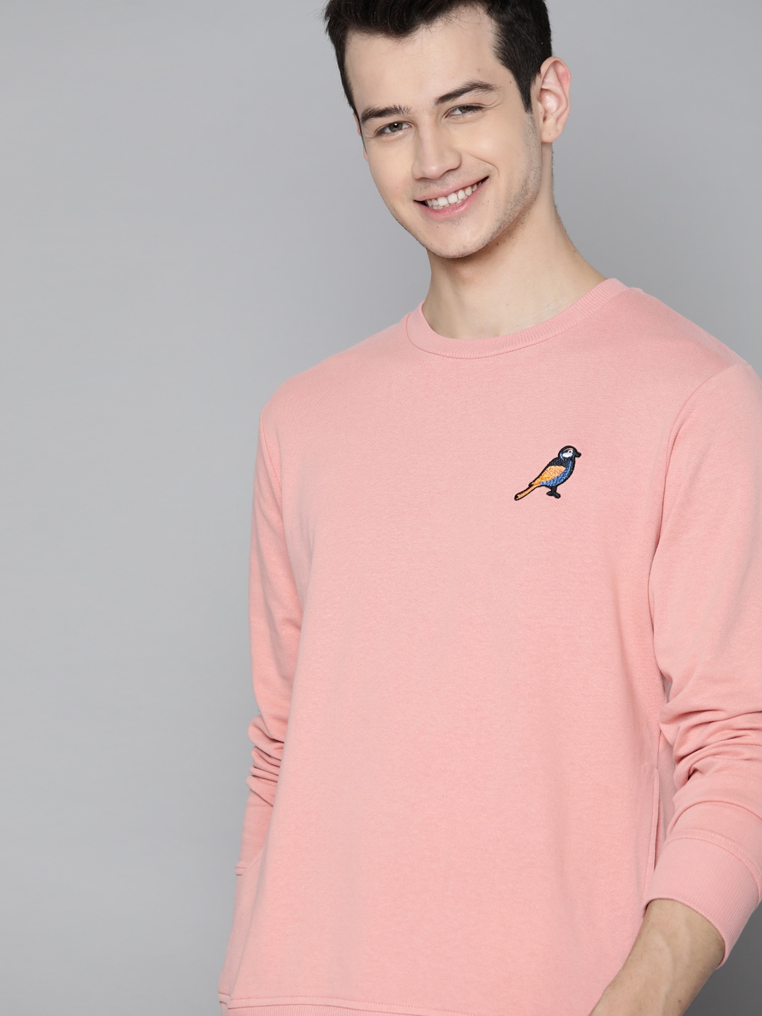 

Mast & Harbour Men Pink Solid Sweatshirt