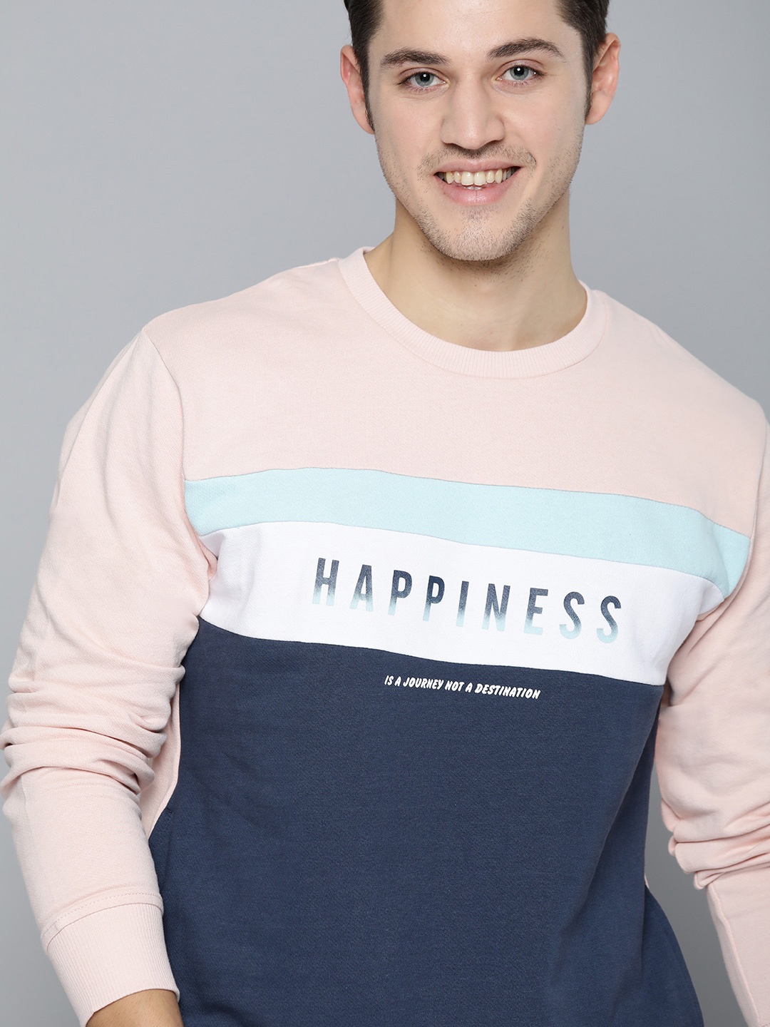 

Mast & Harbour Men Peach-Coloured & Navy Blue Colourblocked Sweatshirt