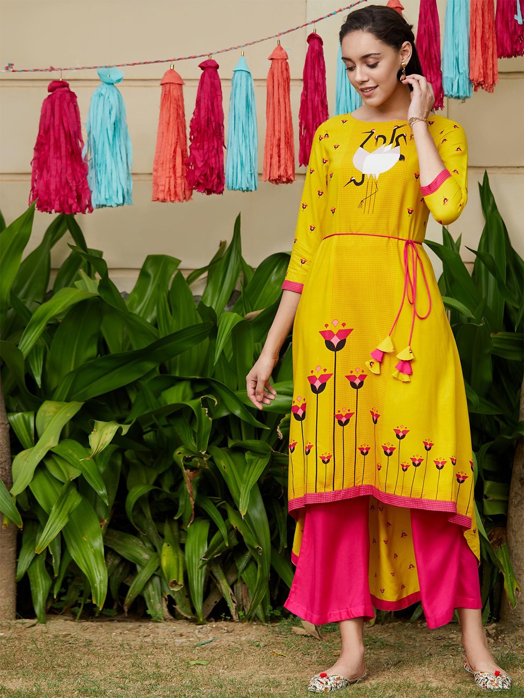 

Pannkh Women Yellow Printed A-Line Kurta