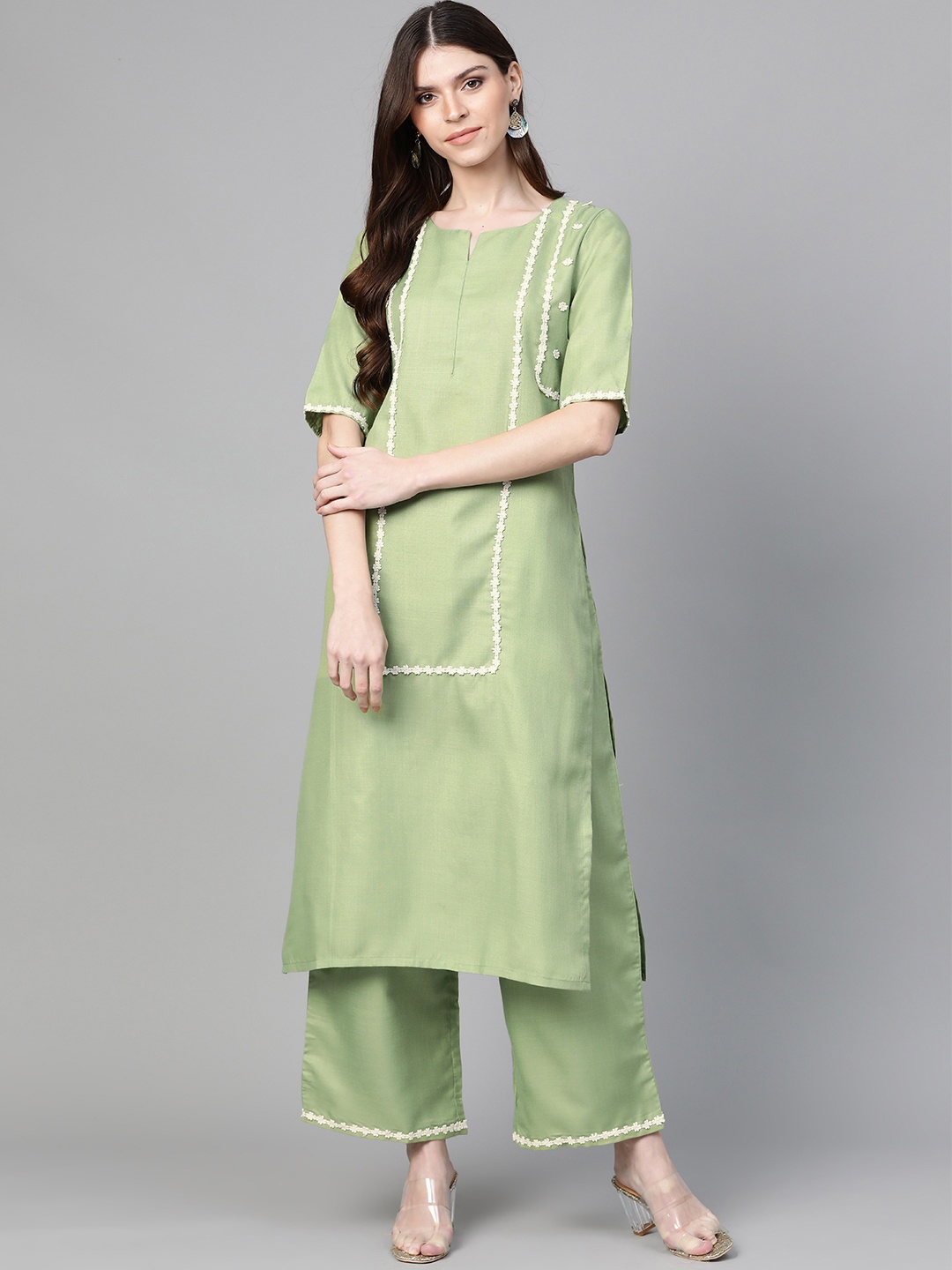 

Bhama Couture Women Green Solid Kurta with Palazzos